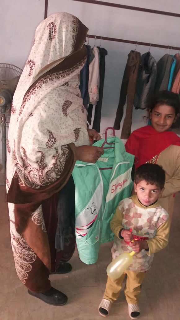 Al-Kauser clothes distribution 3